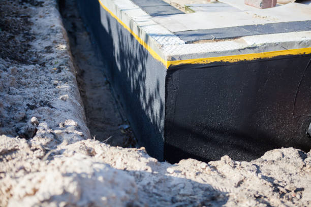 Professional Waterproofing technician working in Springfield, IL